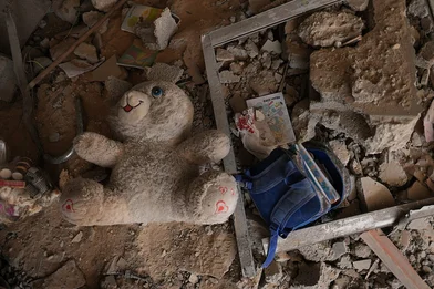 CH1909346-A-child-s-school-backpack-and-a-doll-among-a-rubble-in-Gaza-LR CH1909346-A-child-s-school-backpack-and-a-doll-among-a-rubble-in-Gaza-LR