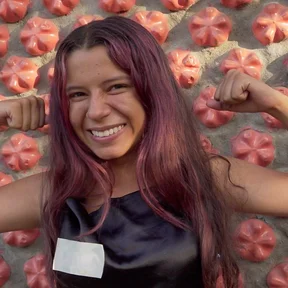 CH1702716-Oriana-15-poses-in-front-of-a-house-she-helped-to-make-out-of-plastic-bottles-filled-with-sand-in-Norte-de-Santander-Colombia_3