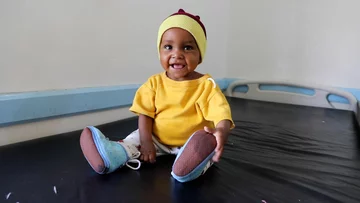 ch1565723-malnutrition-survivor-noor-visits-hospital-for-a-checkup-with-her-mother-safiya-31_1